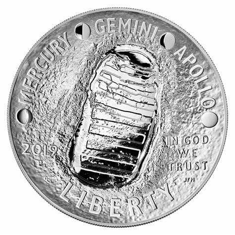 The Apollo 11 Silver Dollar: a coin curved like a spacesuit visor